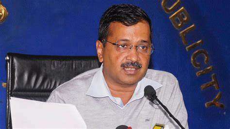 Image of Arvind Kejriwal addressing a crowd at a political rally. Alt text: "Arvind Kejriwal speaking at a political rally."