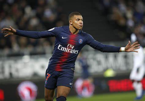 Image: Kylian Mbappé, one of the top-earning athletes globally, showcasing his electrifying speed and skill on the soccer field.