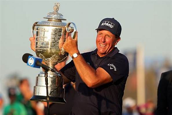 Image: Phil Mickelson, one of the highest-paid athletes globally, demonstrating his golfing expertise on the course